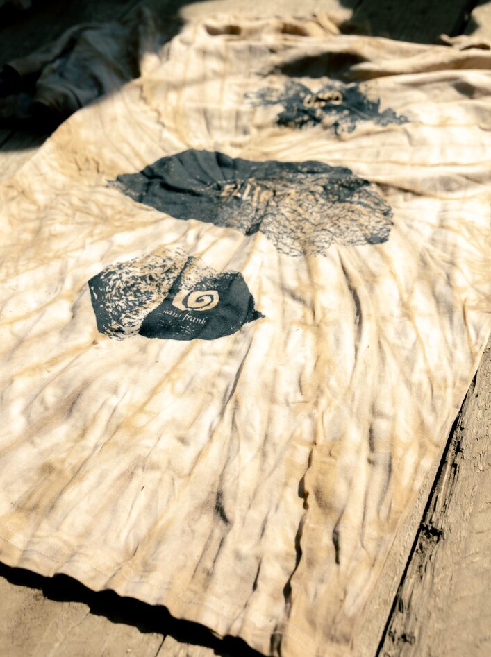 ELLIKER Natural Dyeed Tshirt on table